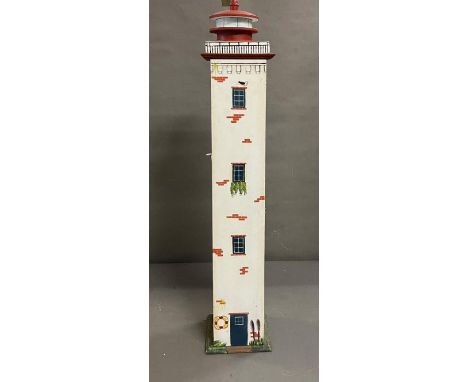 A wooden storage cupboard in the form of a light house (H106cm Sq18cm)