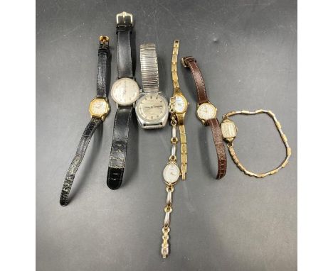 A selection of vintage wristwatches including Timex