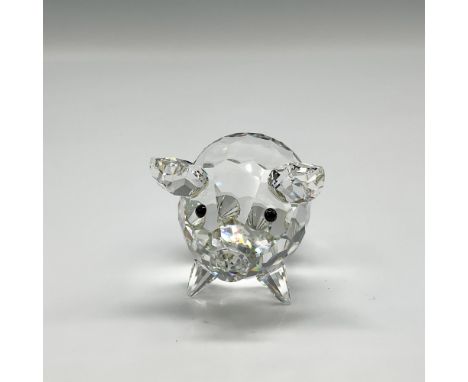 Faceted crystal body with black crystal button eyes and rhodium curly tail is part of the Barnyard Friends theme group. Swaro