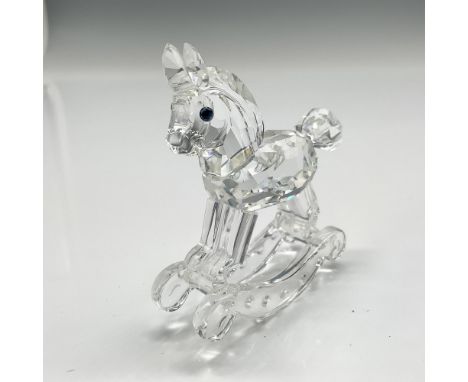 Clear crystal child's toy adorned with crystal rhinestones and blue crystal eyes is part of the When We Were Young series. Sw