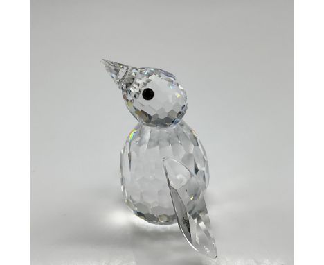Part of the Kingdom of Ice and Snow collection this clear crystal figural is created with head up and black crystal button ey