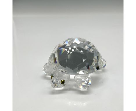 Part of the Endangered Species category. The turtle has a clear crystal body and legs with green crystal eyes. Swarovski back