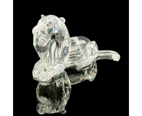 Final piece of the Inspiration Africa trilogy. Annual edition clear crystal lion seated gracefully with frosted crystal. Swar