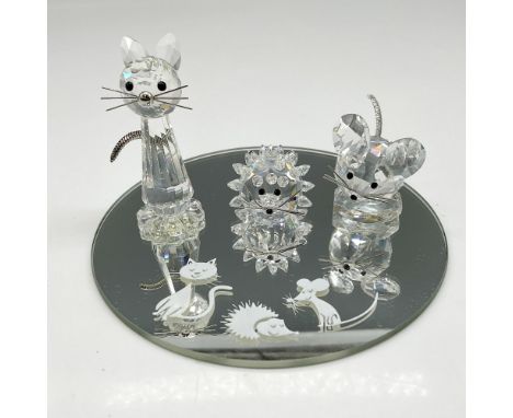 Clear crystal figures with metal whiskers, black crystal eyes and nose. Trio comes with mirrored base. Swarovski backstamp. 7