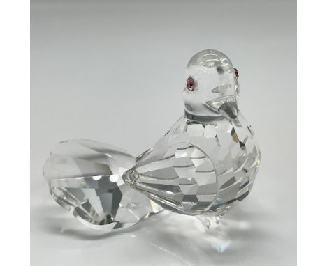 Crystal figural is part of the Feathered Friends collection, created with clear smooth and faceted crystal and pink crystal e