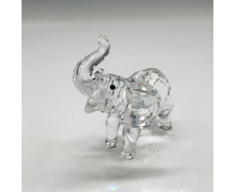 Part of the Rare Encounters theme group, this crystal figure has trunk up, open mouth, ears flared looking at you with jet cr