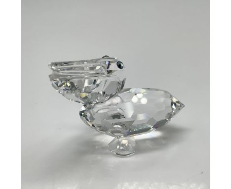 Part of the Feathered Friends collection is created from clear crystal with blue crystal eyes. Swarovski backstamp. 7679 000 