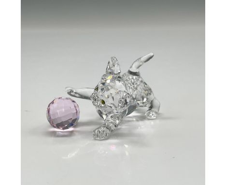 Adorable crystal figural playing with pink ball of yarn, staring intently with his yellow crystal eyes. Swarovski backstamp. 