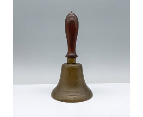 A bronze body with a matching sound bow that features a wooden handle. Dimensions: 8.5"H x 4.25" dia.Condition: Age related w
