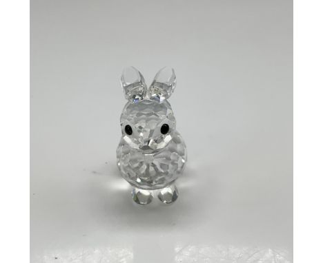 Clear crystal figural sitting with ears back, staring ahead with jet crystal eyes. Member of In A Summer Meadow collection. S