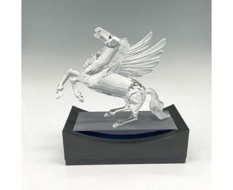 Gorgeous mythical creature with his wings spread wide, rearing back, he looks majestic. Body is clear faceted crystal with hi