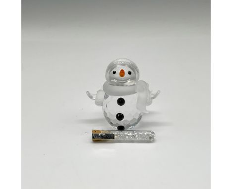 Adorable crystal figural dressed in satin crystal hat, scarf and mittens. His orange crystal nose offsets his jet crystal eye