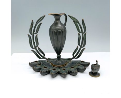 Mid-Century heavy bronze olive branch laurel oil-burning menorah with a beautiful green patina. It includes the Shamash and o