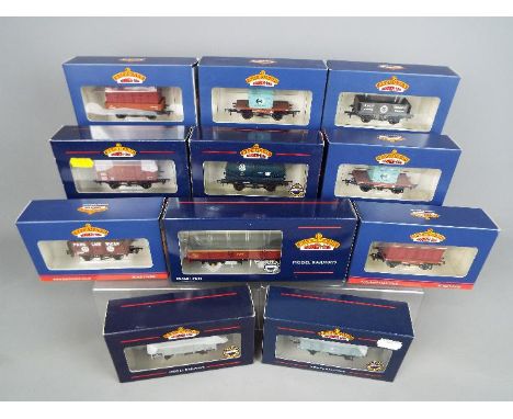 Bachmann - Eleven boxed OO gauge items of rolling stock by Bachmann. Lot includes 37-978 Conflat with AF Container BR Light B