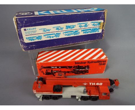 NZG, Gescha - Two boxed diecast model cranes Lot consists of Gescha Gescha Krupp 80 GMT Telescopic Crane in Excellent conditi