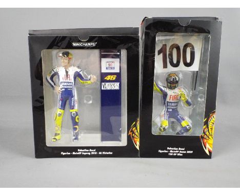 Minichamps Valentino Rossi Collection - two 1:12 scale diecast figures depicting Valentino Rossi, MotoGP Assen 2009, 100 GP w