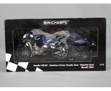 Minichamps - a 1:12 scale diecast model Yamaha YZR-M1, Valentino Rossi, Gauloises Fortuna Yamaha Team, MotoGP 2004, appears m