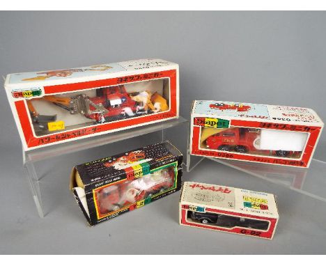 Yonezawa Diapet - Four boxed Japanese diecast vehicles by Yonezawa Diapet in various scales. Lot consists of T-49 Mitsubishi 