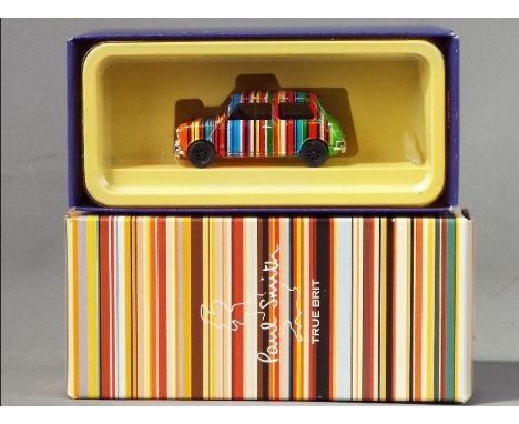 Lledo - A boxed 1:43 scale Paul Smith Mini by Lledo. The model in the Paul Smith striped design appears to be in Mint conditi