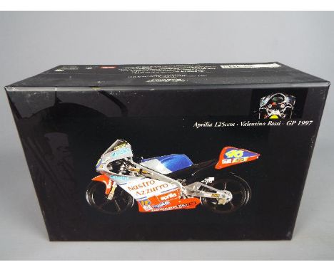 Minichamps Valentino Rossi - a 1:12 scale diecast model, Aprilia 125cc, GP 1997, mint in box with all internal packing pieces