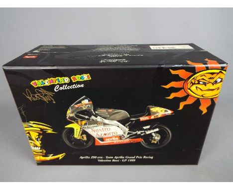 Minichamps Valentino Rossi - a 1:12 scale diecast model, Aprilia 250cc, Team Aprilia GP Racing GP Imola 1999, mint in box wit