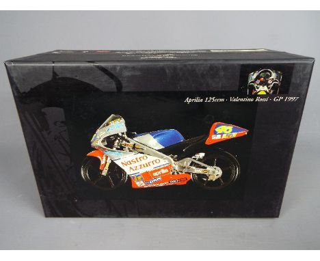 Minichamps Valentino Rossi - a 1:12 scale diecast model, Aprilia 125cc, GP 1997, mint in box with all internal packing pieces