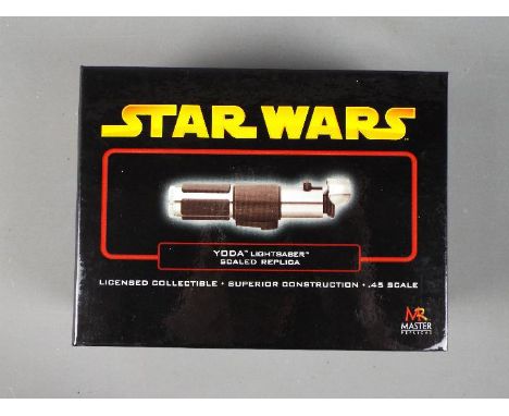 Star Wars, Master Replicas - A Master Replicas .45 scale Star Wars 'Yoda Lightsabre'. The model appears to be in Mint conditi