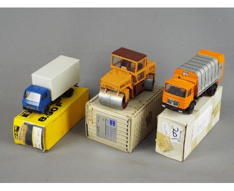 Conrad - Three boxed diecast vehicles. Lot consists of Conrad #2702 Case Vibromax Road Roller; #3037 MAN Truck; and #3033 MAN