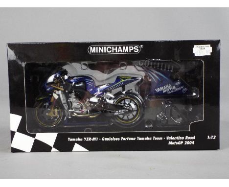 Minichamps - a 1:12 scale diecast model Yamaha YZR-M1, Valentino Rossi, Gauloises Fortuna Yamaha Team, MotoGP 2004, appears m