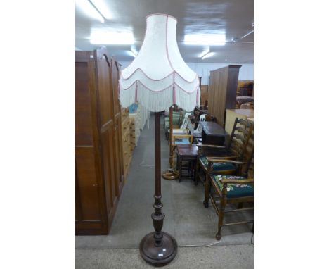 A mahogany standard lamp 