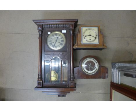 A wall clock and two mantel clocks 