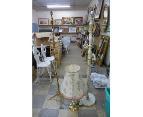 An onyx standard lamp, brass standard lamp and a table lamp 