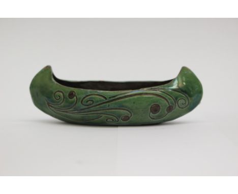 A C. H. Brannam pottery canoe vase, signed and dated 1904