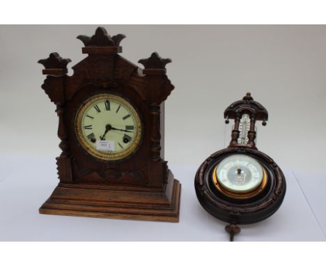 An Ansonia USA Clock Company, New York, mantle clock with enamelled dial, Roman numerals, key and pendulum, together with a m