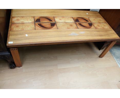 A Danish Trioh teak coffee table, the centre inset with ceramic tiles decorated with a geometric design