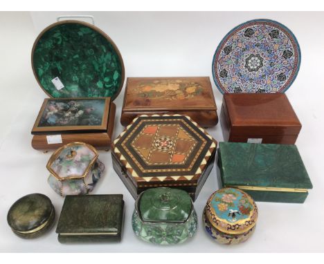 An Italian Sorrento way box and a musical Sorrento ware box, two alabaster boxes, two ceramic musical boxes and two jewel box
