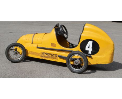 Pedal Car: A yellow, Strike's Racing, Model 750 Racer, racing pedal car, No.4, fibre glass body, with make believe engine con