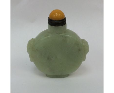 A yellow jade snuff bottle