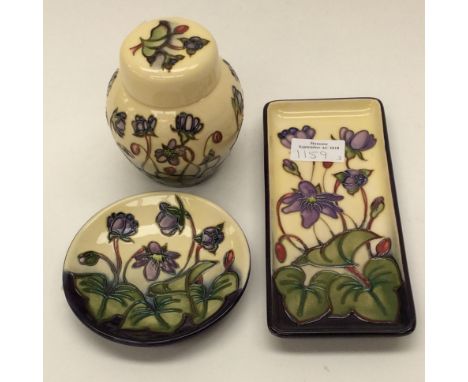 Moorcroft ginger jar and cover in the Hepatica pattern, standing approx 11 cms high (4¼ ins), 1st quality, boxed, with a boxe