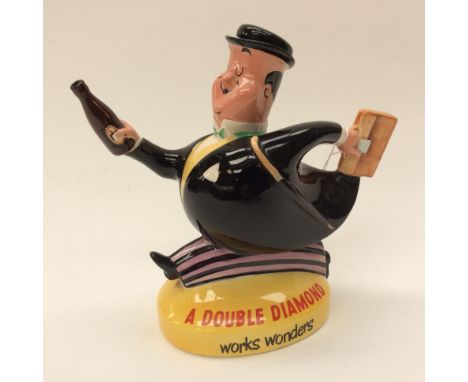 Beswick: A ceramic Double Diamond advertising figure, 'A Double Diamond works wonders', slight damage to hat, 1517, 21cm high