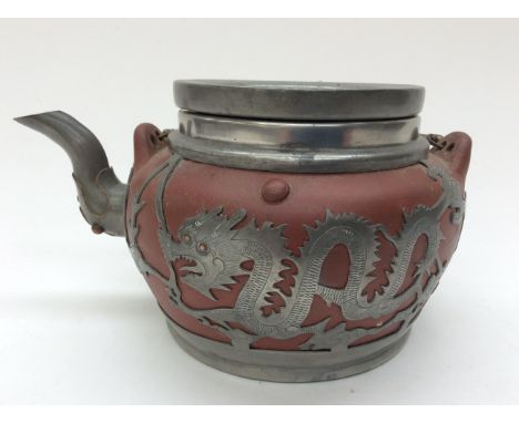 A Terracotta teapot 