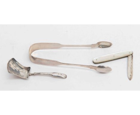 A George III silver caddy spoon (Birmingham 1811), a pair of Victorian silver sugar bows, silver and mother of pearl fruit kn