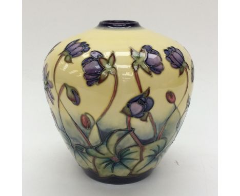 A Moorcroft bulbous vase in Hepatica pattern, standing approx 16 cm high (6½ inches) high, designed by Emma Bossons, dated to