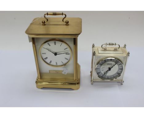 A large 'Rapport', London, battery driven mantle clock in carriage clock styling, brass casing, together with a Staiger Curom