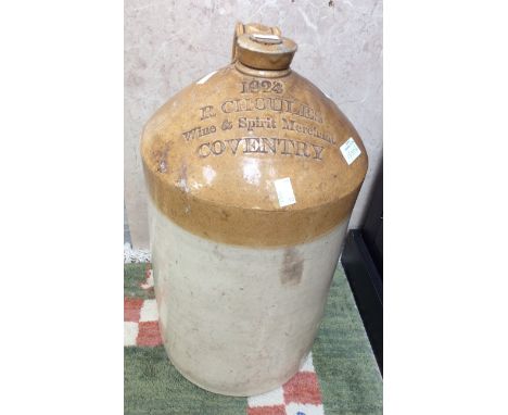 Stoneware flagon, imprinted '1924, R. Choules Wines & Spirit Merchant, Coventry', standing approx 54cm high, with cork stoppe