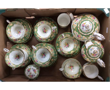 A Paragon 'Pompadour' part tea service, comprising: eight cups; eleven saucers; six plates; honey pot; teapot; hot water jug;