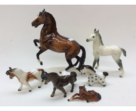 Goebel rearing horse imprinted CE 309 to base with Goebel pony 16/10 and further Goebel ponies (6) 