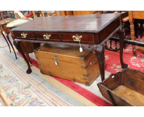 A Chippendale style mahogany three drawer side table