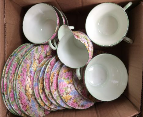 Shelley 'Rock Garden' part tea service, comprising six cups, six saucers and six side plates, milk and sugar 
