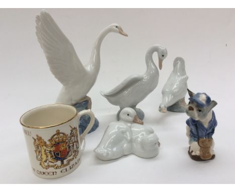 Nao figures, a large goose and three other geese figures, together with a Szeiler 'bulldog' (af) and a Gray's pottery Coronat